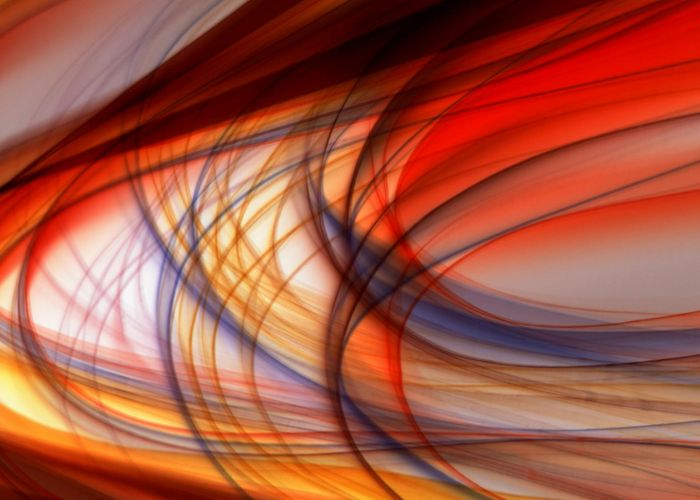 Abstract waves of cold light representing physical energy flow